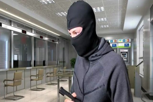 經理邊玩手機邊與搶銀行男子聊天 搶銀行判刑多久